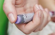 Woman doing insulin injection