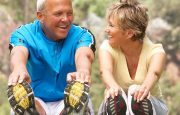 A man and woman are stretching together