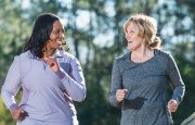 Two women are exercising together