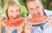 Couple eating watermelon