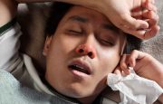 A man is sick with the flu